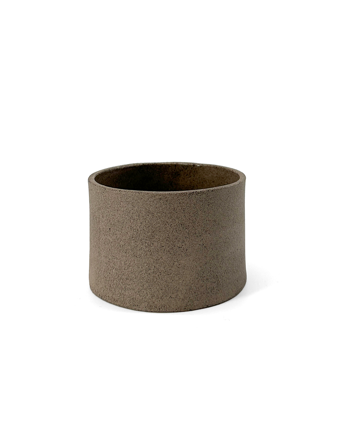 Grey, ceramic, matte coffee cup by klangnapha on a white background.