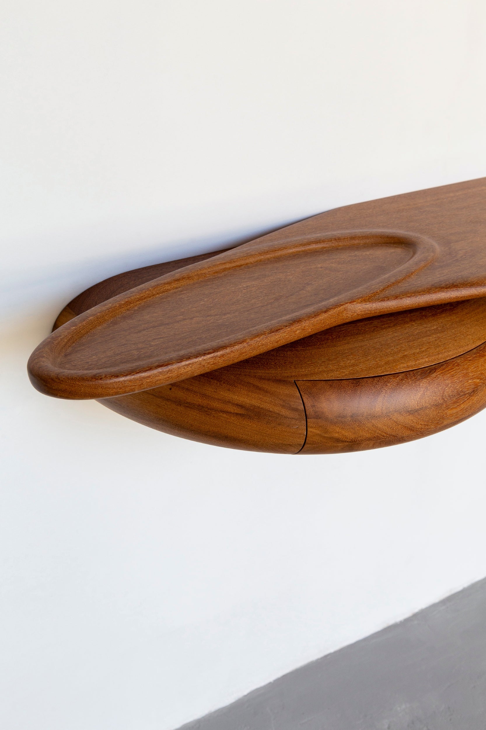 Shelf by Estudio Prosa on a white wall.