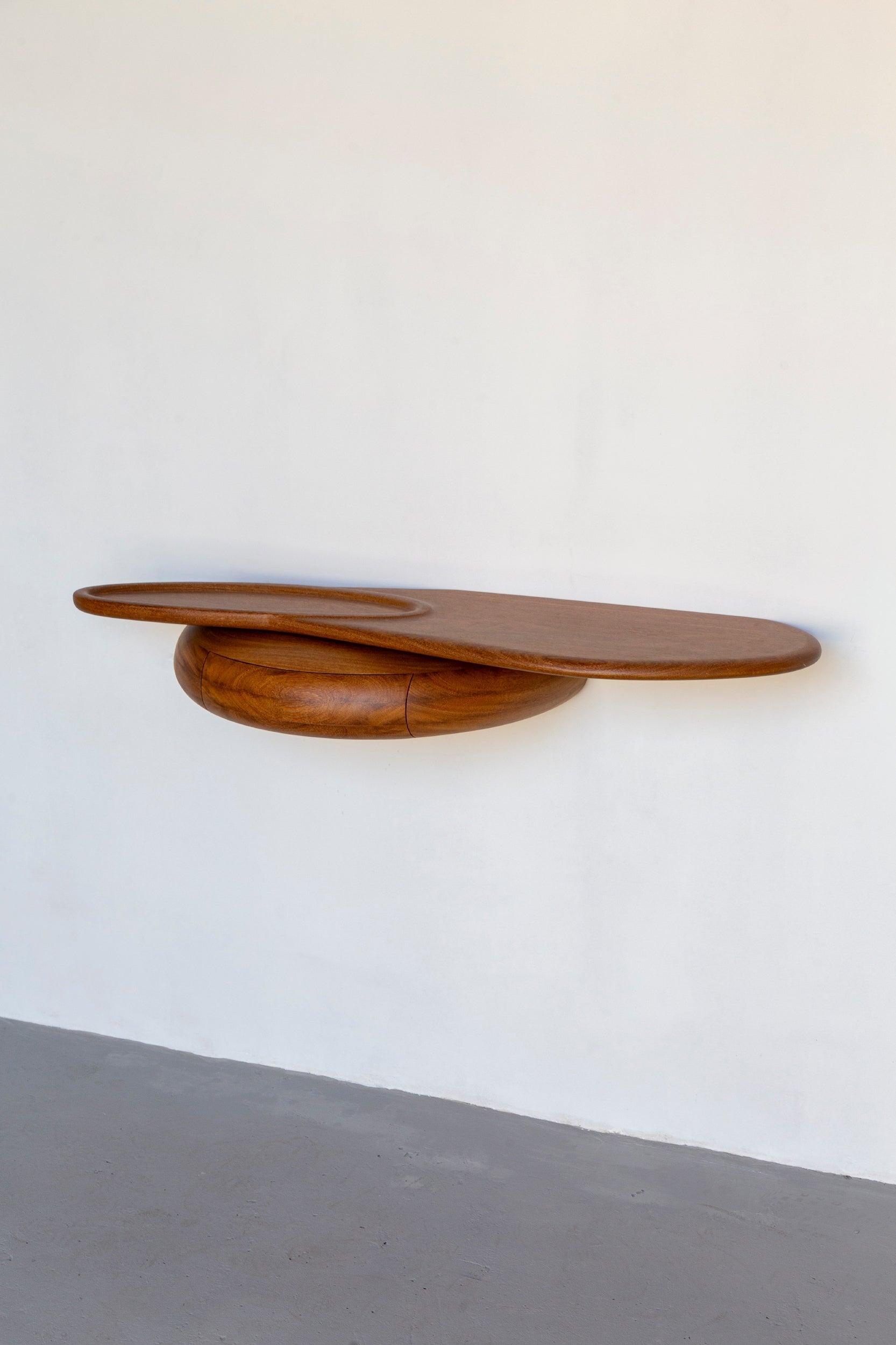 Shelf by Estudio Prosa on a white wall.