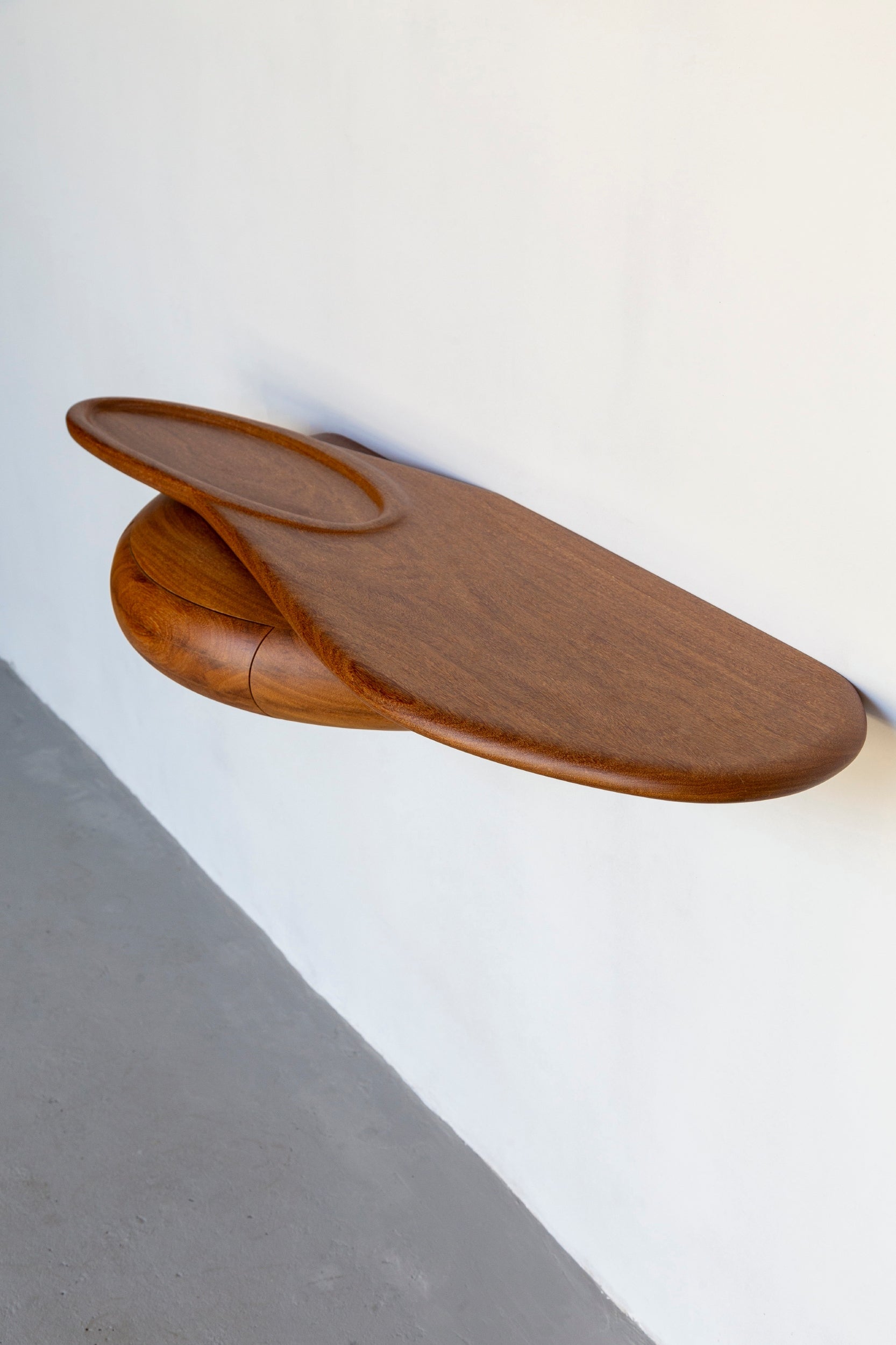 Shelf by Estudio Prosa on a white wall.