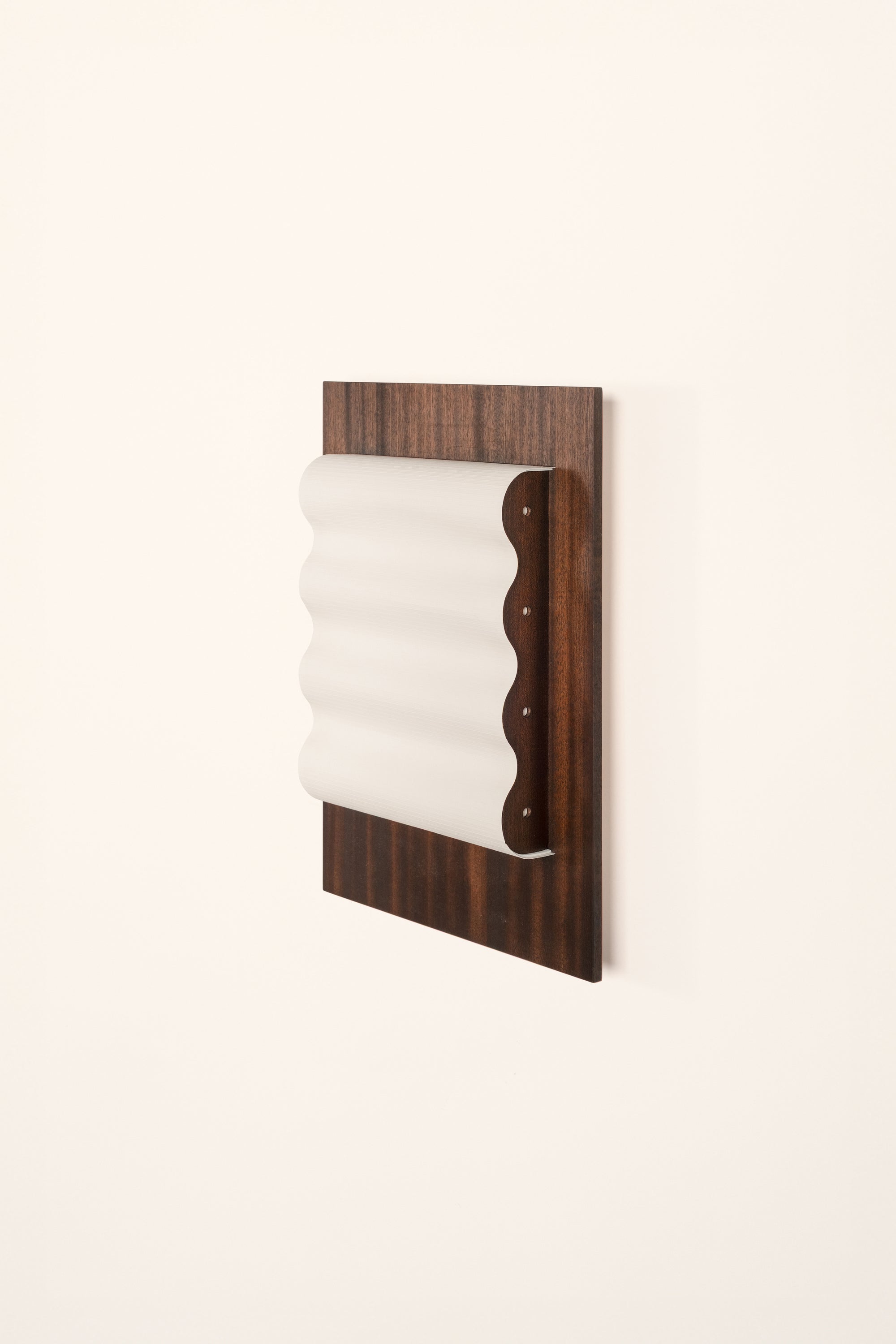 Framed wall light fixture in wood with a paper shade by Violaine d'Harcourt on a white background with light off.