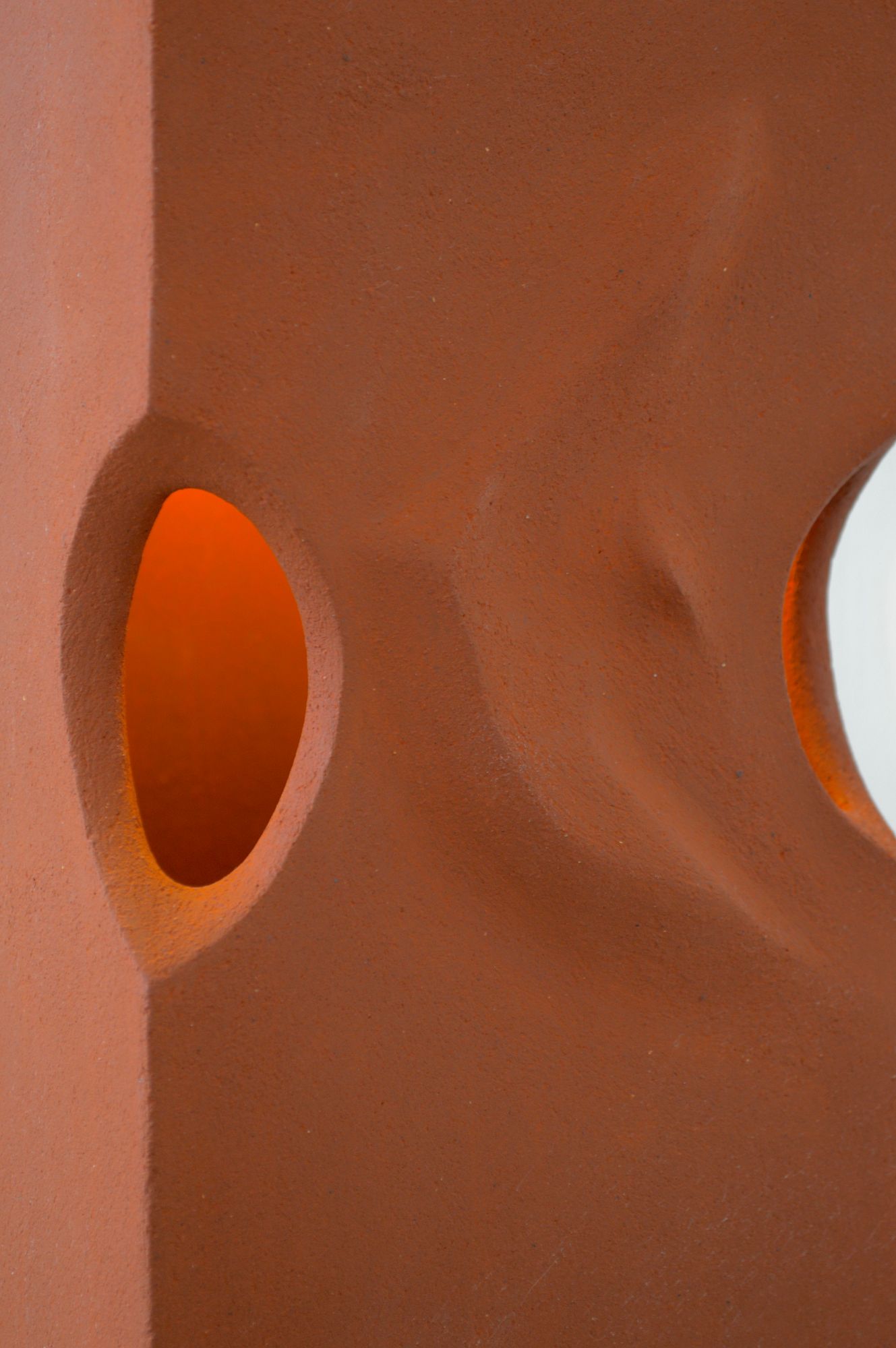 Close up of ceramic lamp by Zeynep Boyan with the light on.