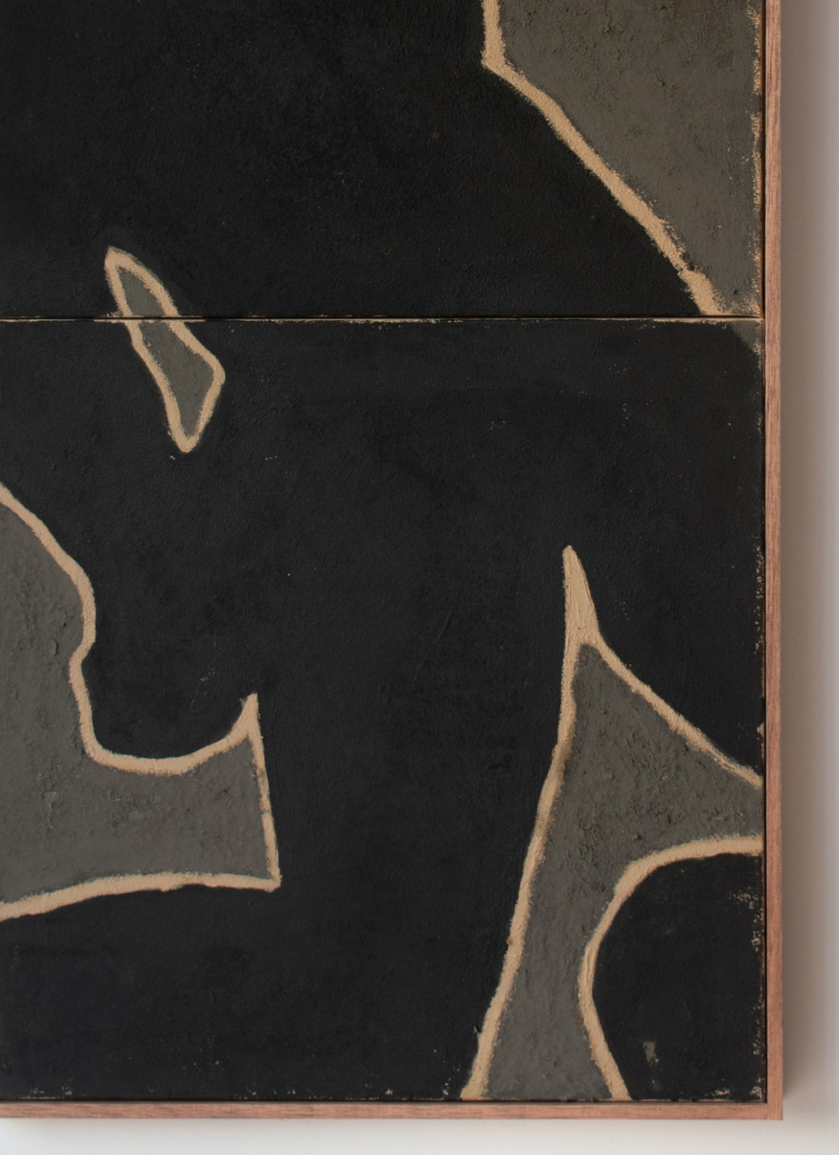 Original abstract wall art by Marcsen in black and earthy green tones housed in a vertical wooden frame and displayed on a neutral wall.