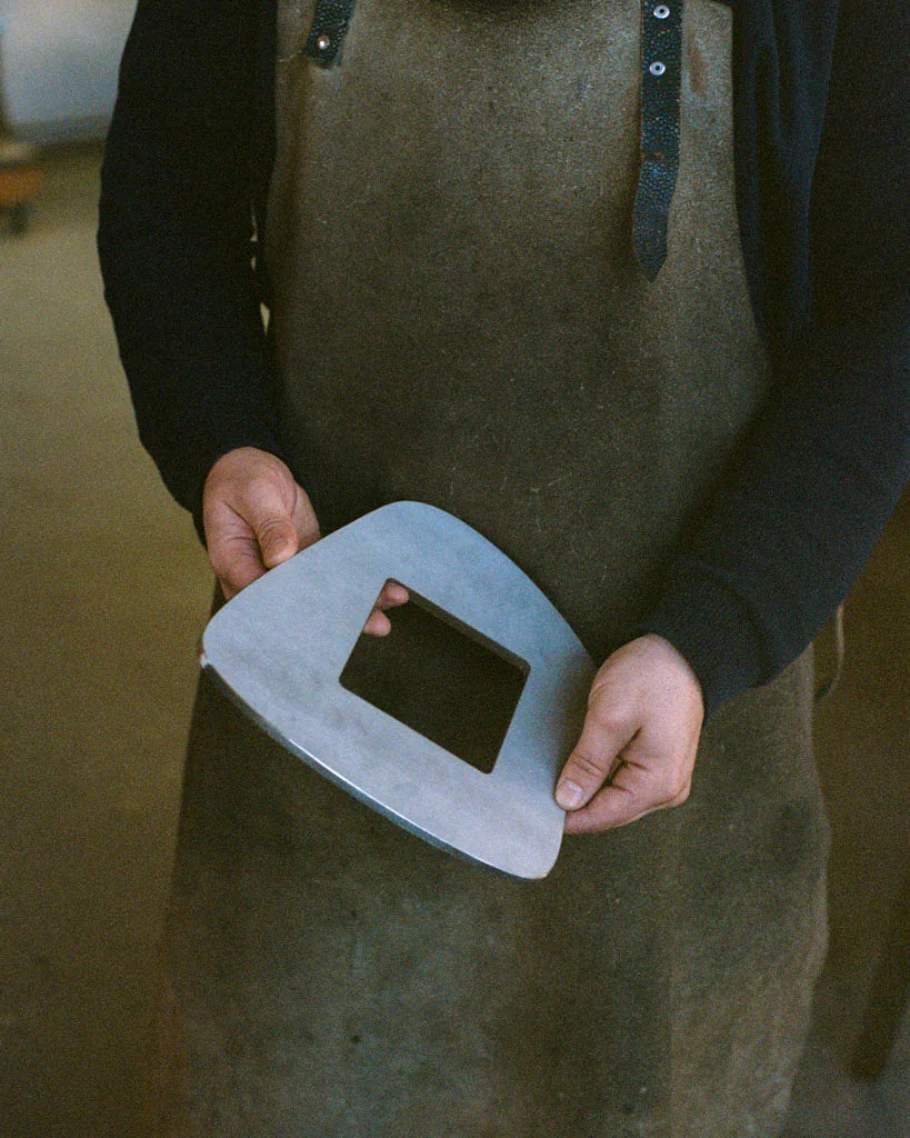 Image of PARCTA holding a single vase component that they have manufactured.