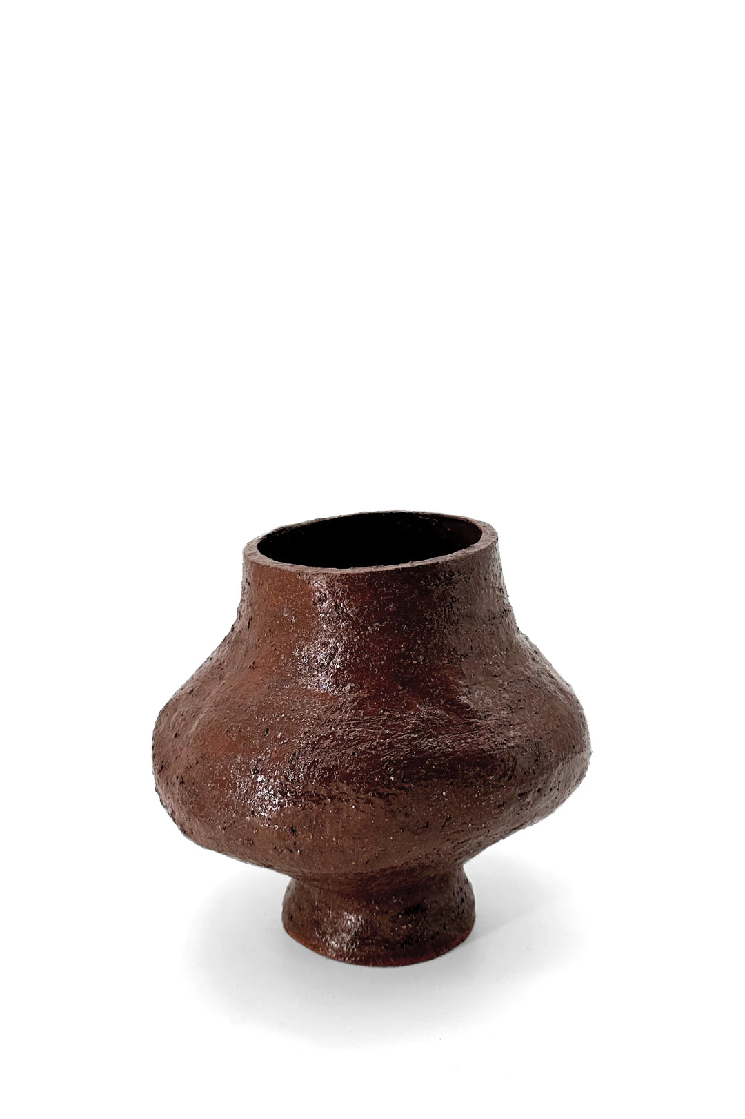 Rounded, brown ceramic vase by klangnapha on a white background.